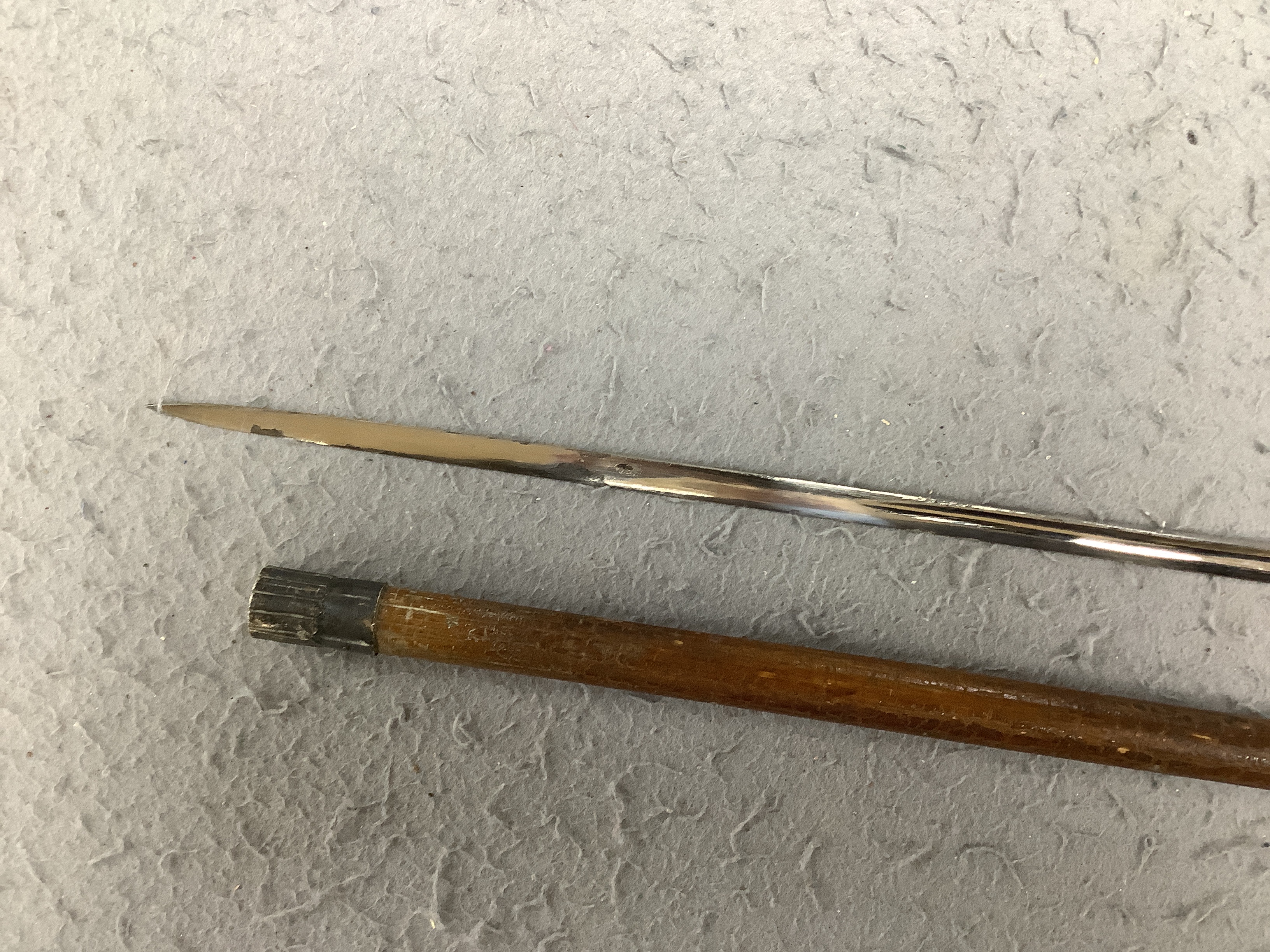 Four Victorian silver mounted handled walking sticks: one being a sword stick, sword stick 90cm long